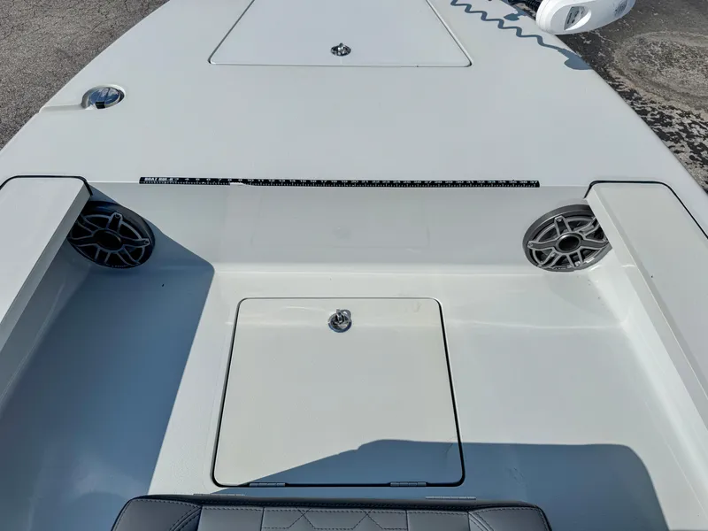 Slide: The Image of Vtech 18Flats 2022 boat deck with storage compartment and speakers. - 15