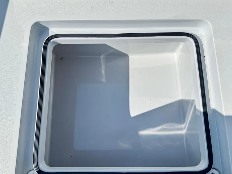 Slide: The Image of Vtech 18Flats 2022 model, white compartment with black trim, open lid view. - 16