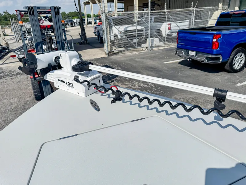 Slide: The Image of Vtech 18Flats 2022 boat with Minn Kota trolling motor in parking lot. - 19