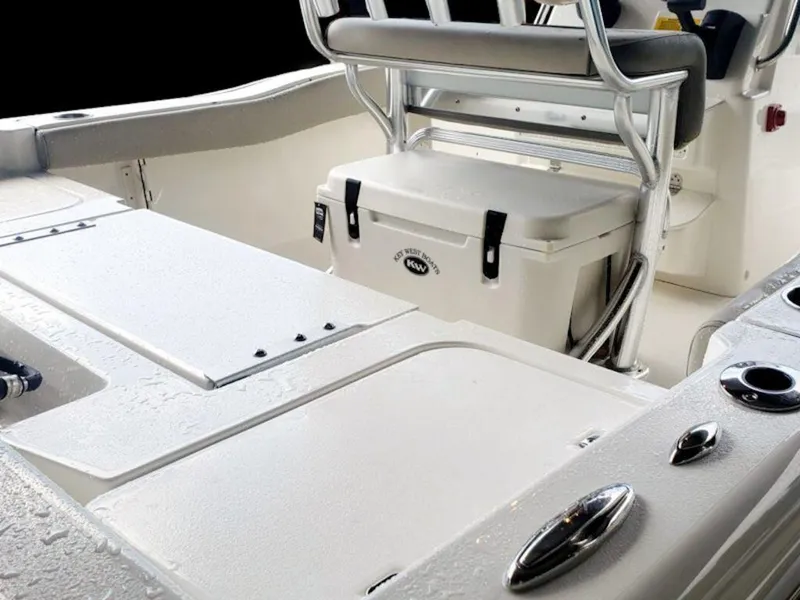 Slide: The Image of 2025 Key West 179 FS boat interior with seating and storage. - 16
