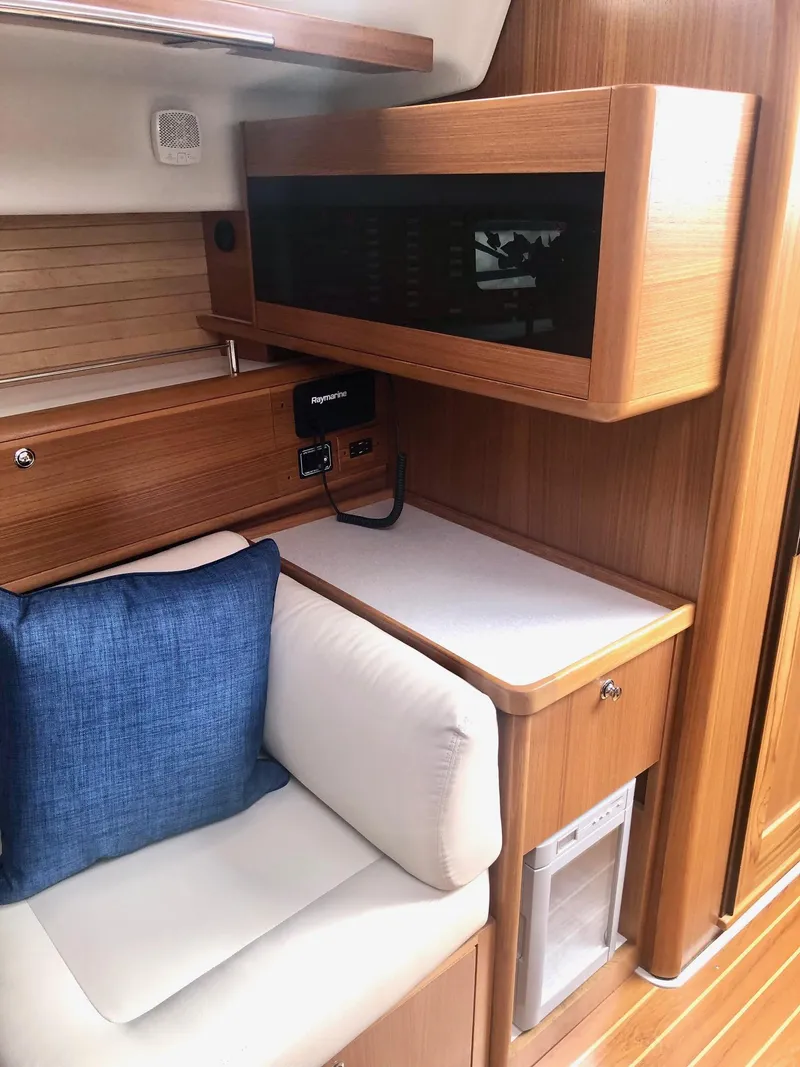 Slide: The Image of Interior of 2023 Catalina 425 yacht with wooden finish and comfortable seating. - 14
