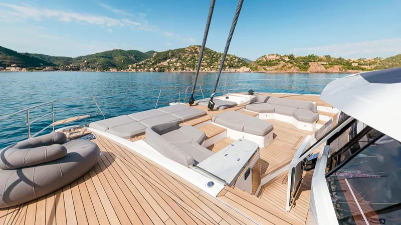 Slide: The Image of Luxurious 2025 Fountaine Pajot Thira 80 yacht with spacious deck and scenic ocean view. - 7