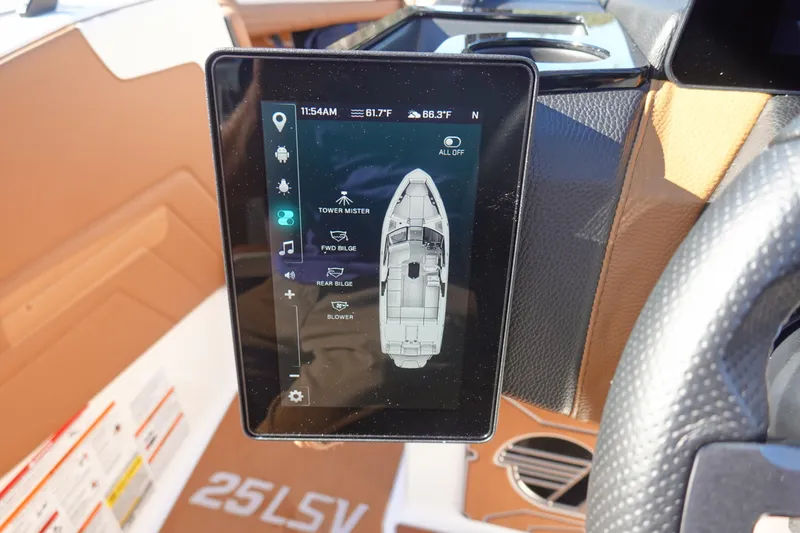 Slide: The Image of 2025 Malibu Wakesetter 25 LSV touchscreen display showing boat controls and settings. - 18