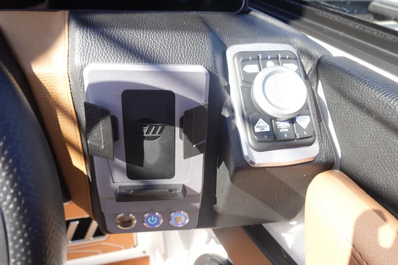 Slide: The Image of Control panel of 2025 Malibu Wakesetter 25 LSV boat with modern interface. - 20