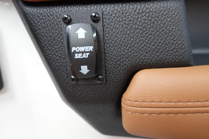 Slide: The Image of Power seat control in 2025 Malibu Wakesetter 25 LSV boat interior. - 22