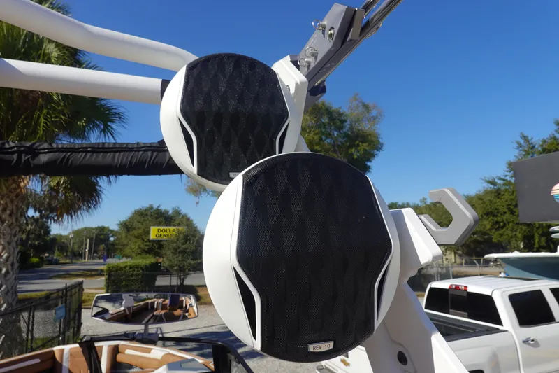 Slide: The Image of 2025 Malibu Wakesetter 25 LSV boat speakers, mounted on a wakeboard tower. - 43