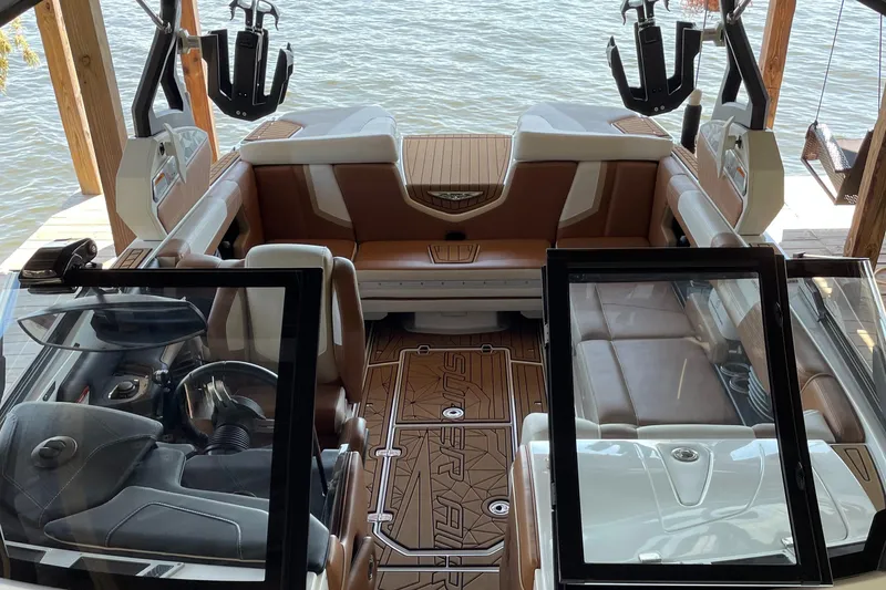 Slide: The Image of 2019 Nautique Super Air Nautique G23 Coastal Edition interior with luxurious seating and sleek design. - 10
