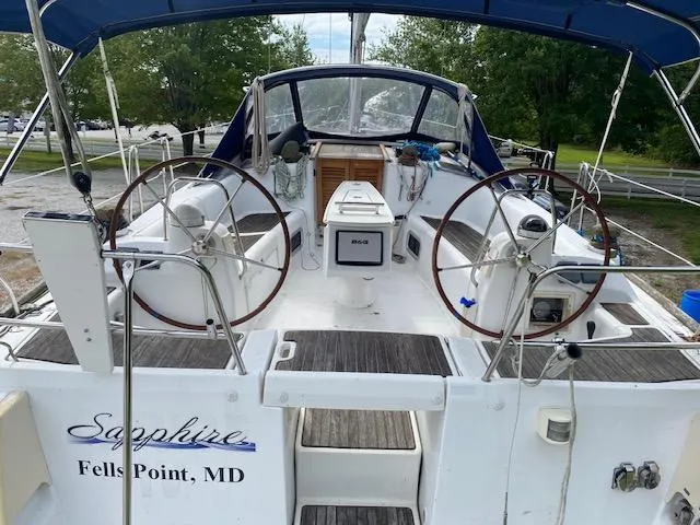 Slide: The Image of Beneteau Oceanis 40 sailboat cockpit, dual steering wheels, docked at Fells Point, MD. - 12