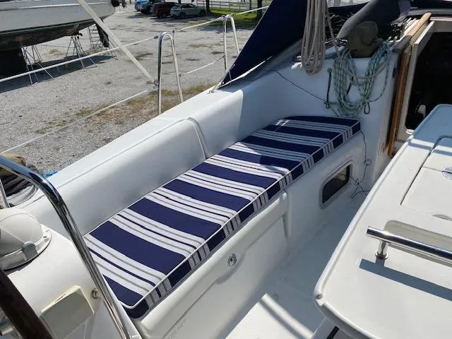 Slide: The Image of Beneteau Oceanis 40 sailboat deck with striped cushions, 2009 model. - 7