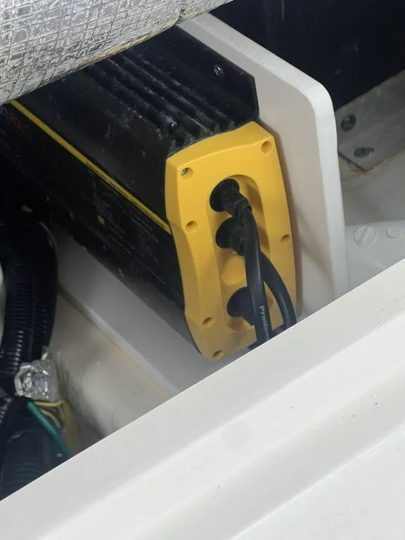 Slide: The Image of 2023 Robalo R242 boat electrical component with yellow connectors. - 36