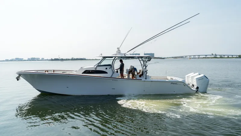 The Image of 2023 Front Runner 47 Center Console boat cruising on calm waters. - 1