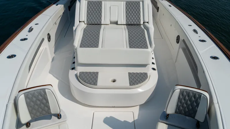 Slide: The Image of 2023 Front Runner 47 Center Console boat interior with luxurious seating and sleek design. - 27