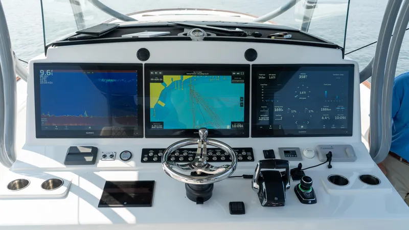 Slide: The Image of 2023 Front Runner 47 Center Console dashboard with advanced navigation displays and controls. - 36