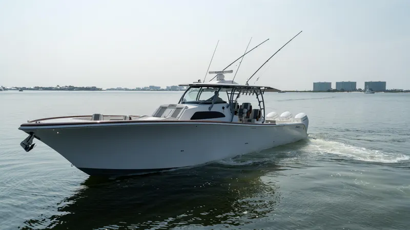 Slide: The Image of 2023 Front Runner 47 Center Console boat cruising on calm water. - 6