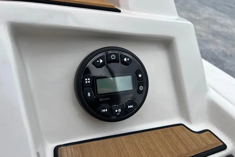Slide: The Image of 2024 Starcraft SVX 211 OB boat audio control panel with Bluetooth connectivity. - 23