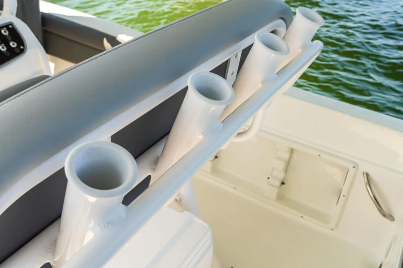 Slide: The Image of Rod holders on 2025 NauticStar 231 Hybrid boat, interior view. - 28