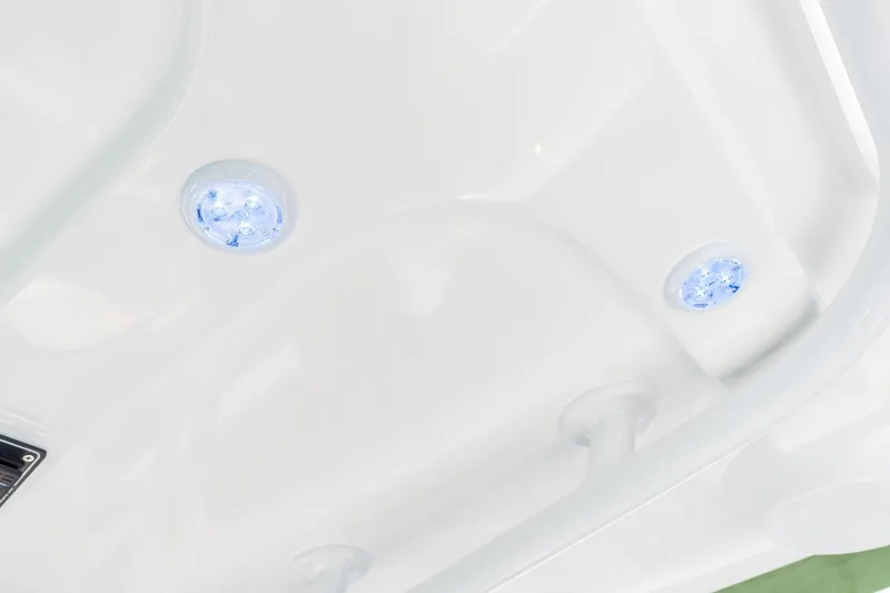 Slide: The Image of 2025 NauticStar 231 Hybrid boat with LED lights on the deck. - 33