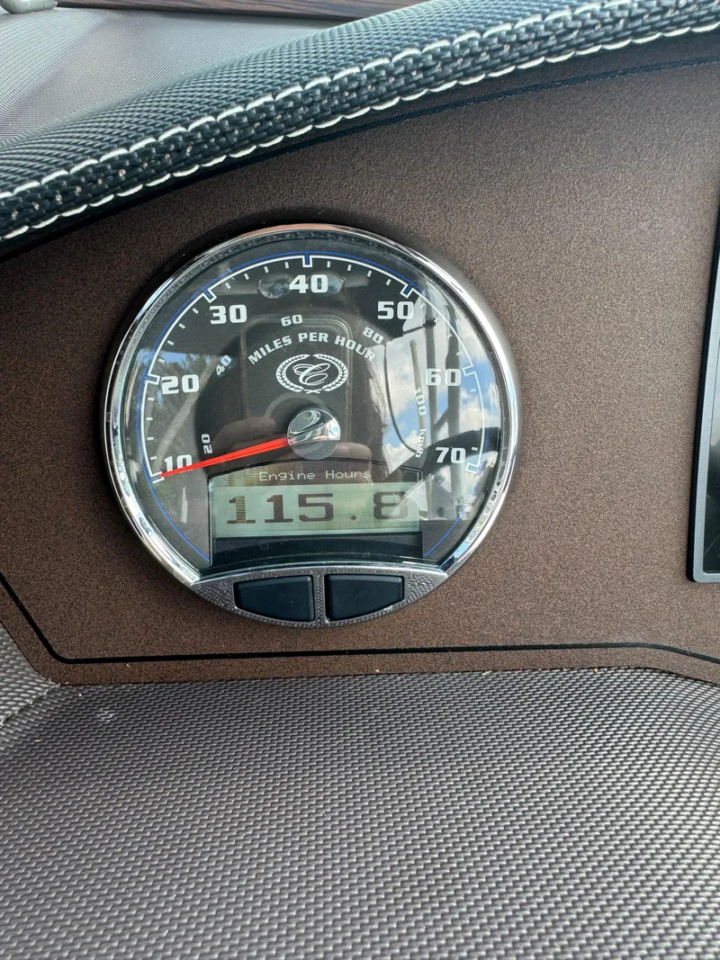 Slide: The Image of 2015 Cobalt R7 speedometer displaying 115.6 engine hours. - 23