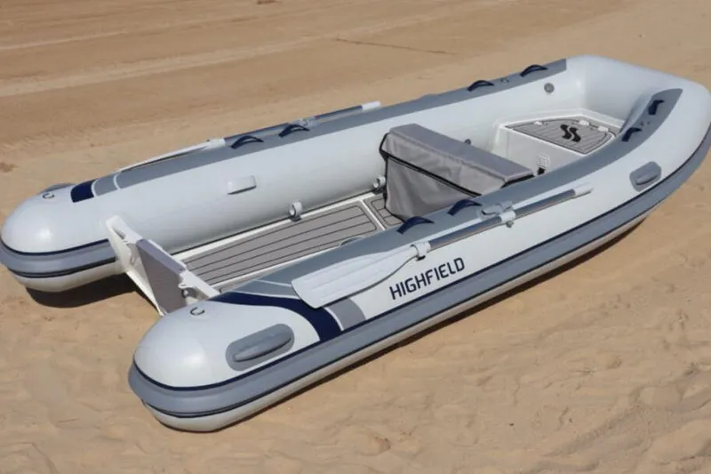 Slide: The Image of 2025 Highfield CL360 inflatable boat on sandy beach. - 10