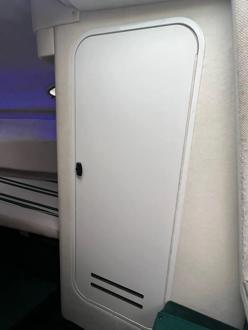 Slide: The Image of Interior cabin door of 2000 Sea Ray 240 Sundancer boat. - 18