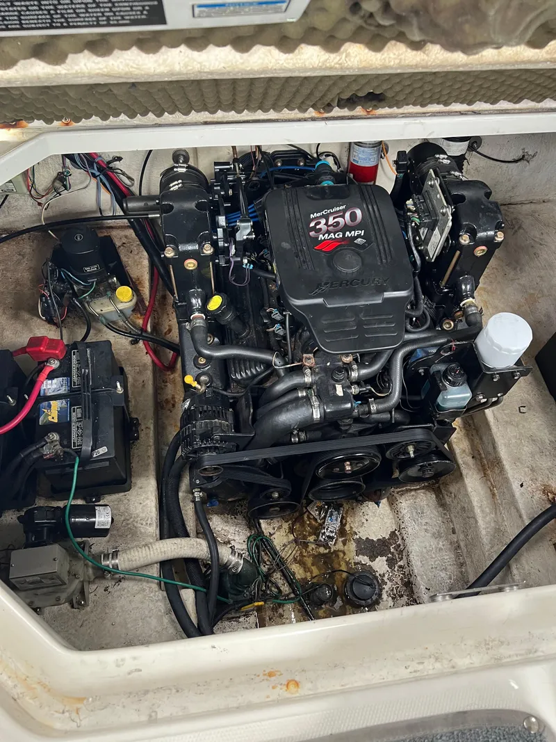 Slide: The Image of Engine compartment of 2000 Sea Ray 240 Sundancer with 350 Mag MPI engine. - 21