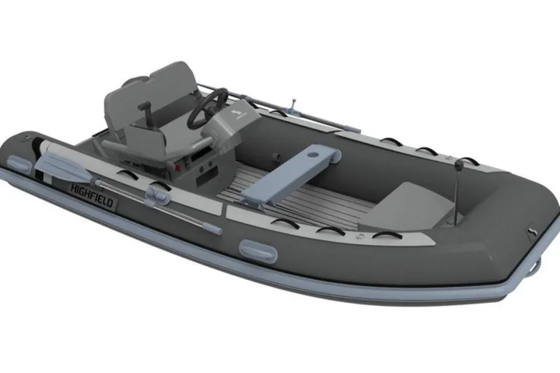 Slide: The Image of 2025 Highfield CL380 inflatable boat, gray with seating and steering console. - 5