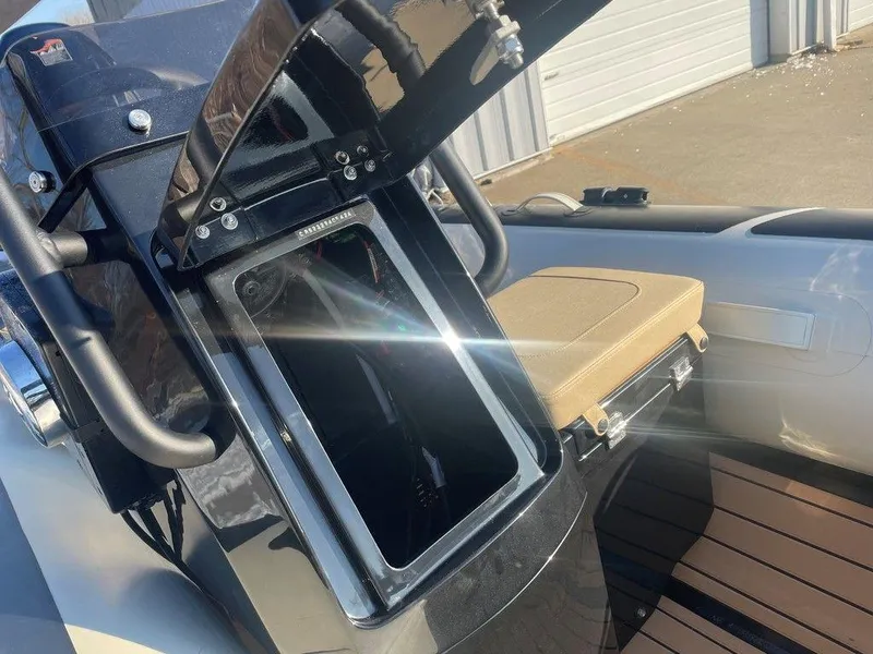 Slide: The Image of 2025 Highfield CL360 GT SE boat storage compartment with red fuel tank. - 13