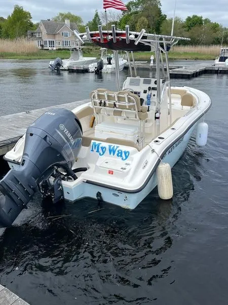Slide: The Image of 2020 Key West 219fs boat docked with Yamaha engine and "My Way" text on the stern. - 4