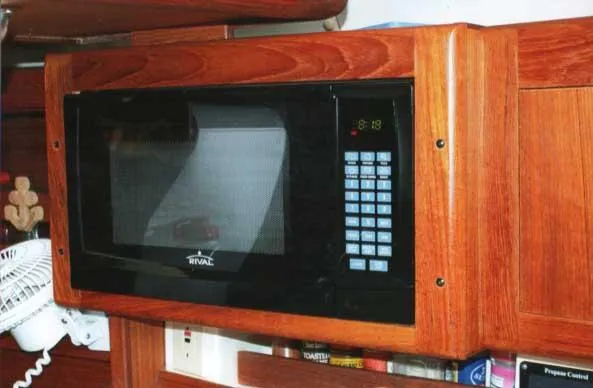 Slide: The Image of Built-in microwave in a 1999 Hunter 380 yacht kitchen. - 11