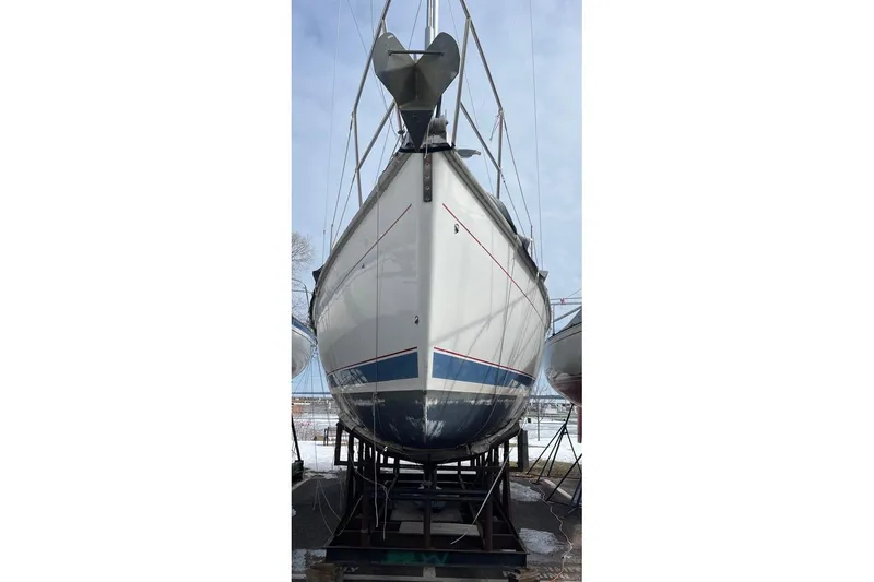 Slide: The Image of 1999 Hunter 380 sailboat on dry dock, viewed from the bow. - 31