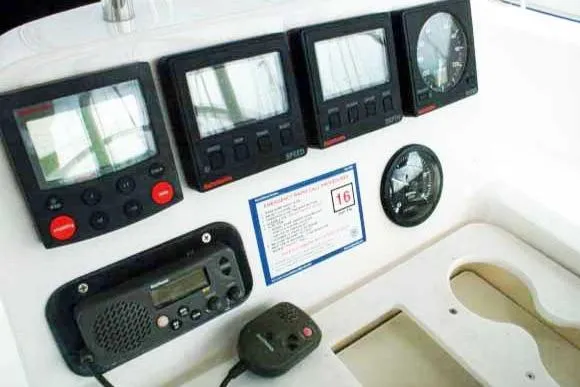 Slide: The Image of Control panel of a 1999 Hunter 380 sailboat with navigation instruments. - 56