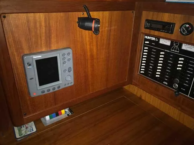 Slide: The Image of Control panel of a 1999 Hunter 380 sailboat with navigation equipment. - 8