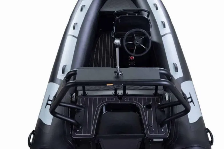 Slide: The Image of 2025 Highfield Sport390 inflatable boat, top view of steering console and seating area. - 4