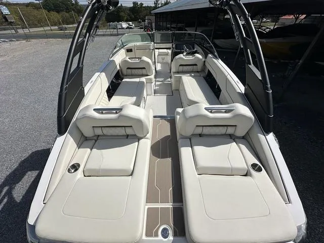 Slide: The Image of 2025 Regal LS6 boat interior with luxurious seating and modern design. - 10