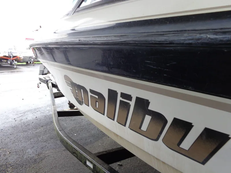 Slide: The Image of 1998 Malibu Sunsetter VLX boat on trailer, side view. - 17