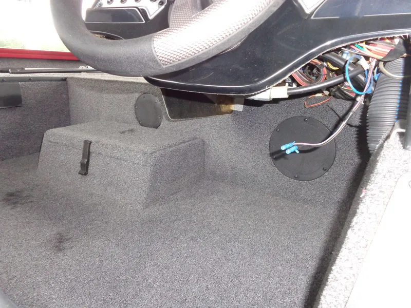 Slide: The Image of 2020 Lowe Stinger 175C boat interior wiring and steering wheel detail. - 14