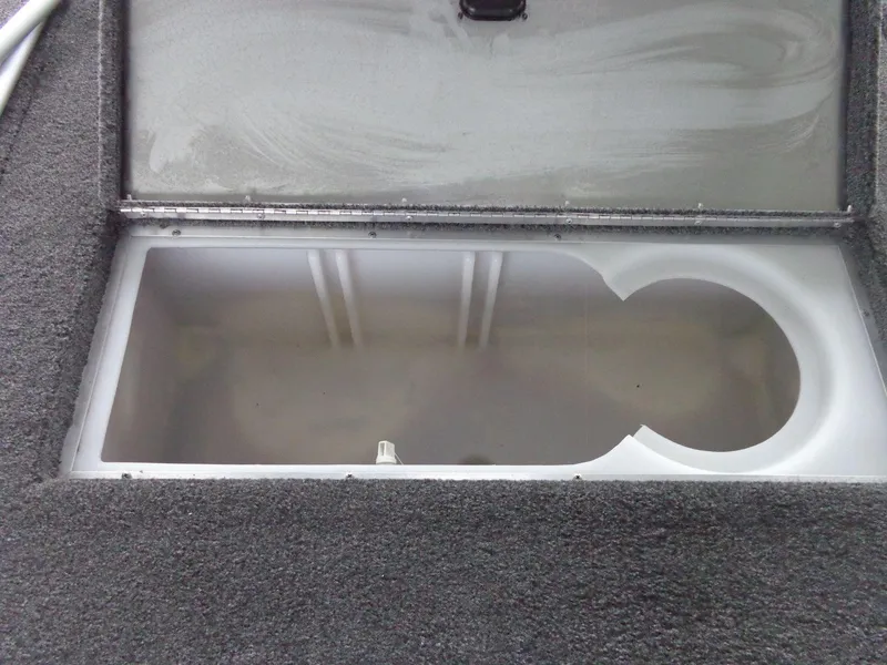 Slide: The Image of Open storage compartment in 2020 Lowe Stinger 175C boat. - 37