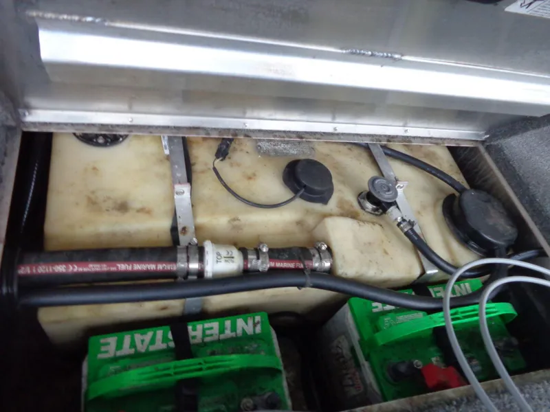 Slide: The Image of 2020 Lowe Stinger 175C boat fuel tank and battery compartment. - 8