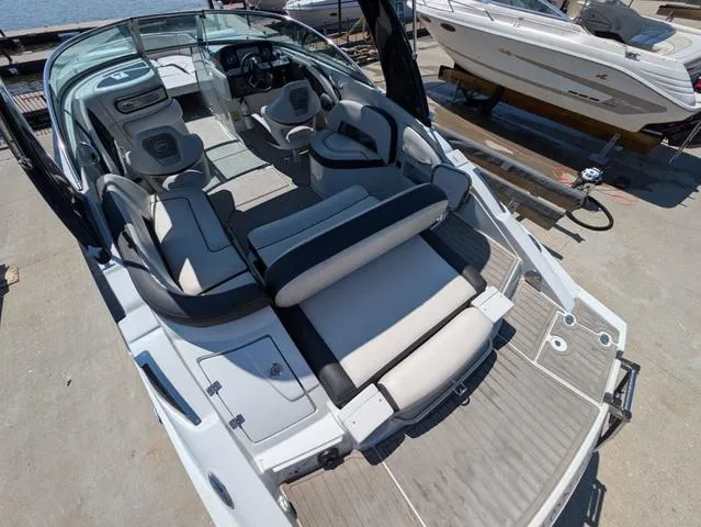 Slide: The Image of 2022 Crownline 255 SS boat interior with spacious seating and modern design. - 6