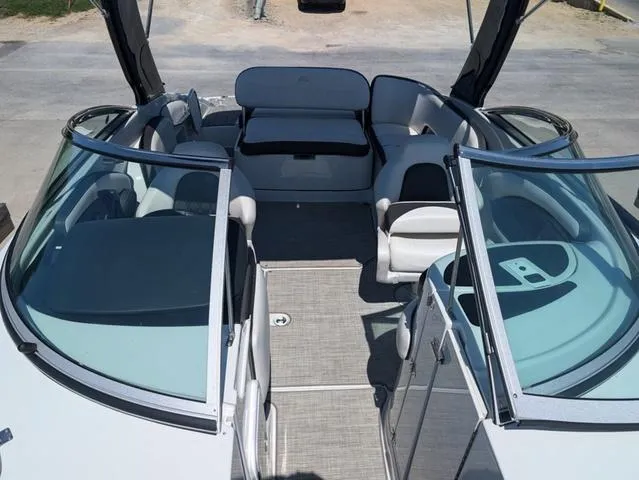 Slide: The Image of 2022 Crownline 255 SS boat interior with spacious seating and modern design. - 8