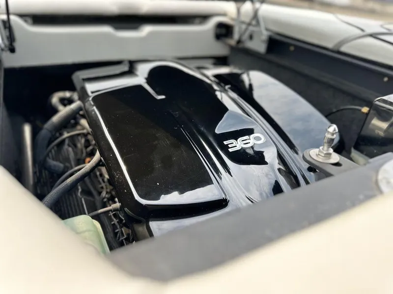 Slide: The Image of Close-up of a 2016 Sanger 237LTZ engine with "360" marking. - 16