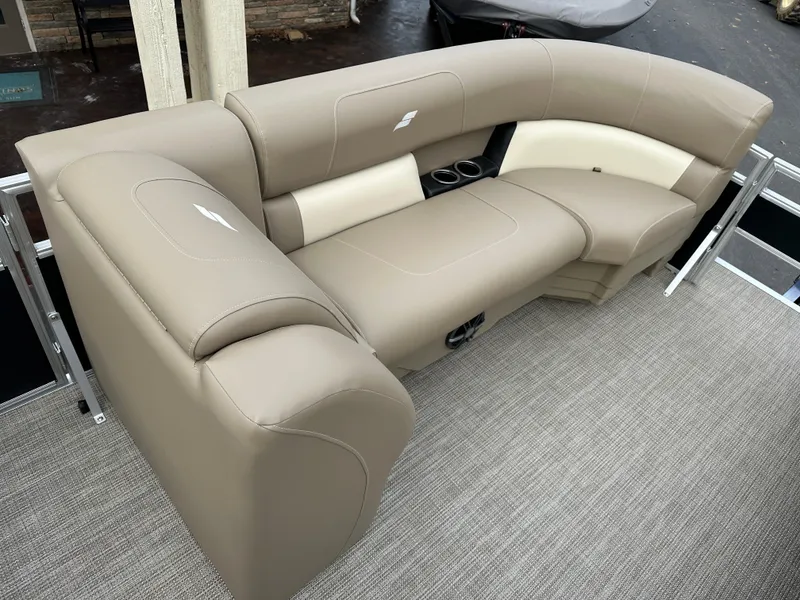 Slide: The Image of 2024 Starcraft LX 22 F boat seating, beige and cream upholstery, with integrated cup holders. - 13