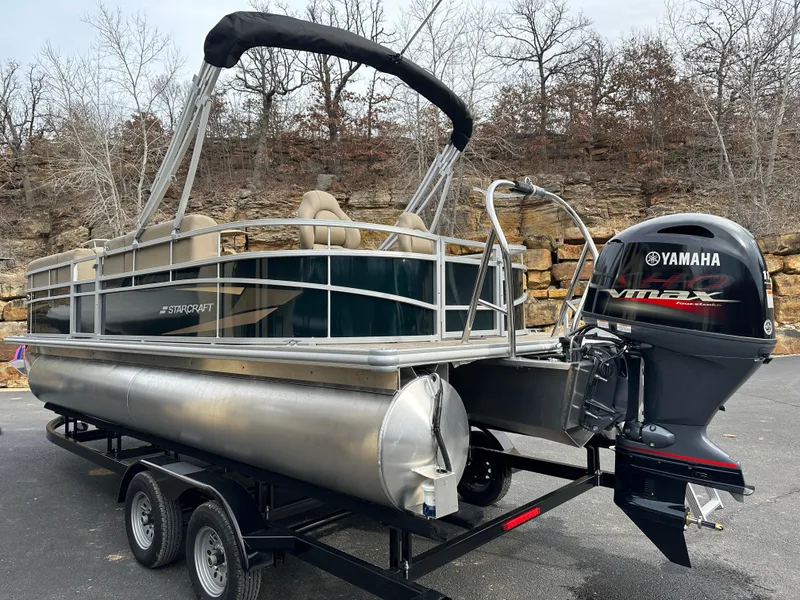 Slide: The Image of 2024 Starcraft LX 22 F pontoon boat with Yamaha VMAX engine on trailer. - 3