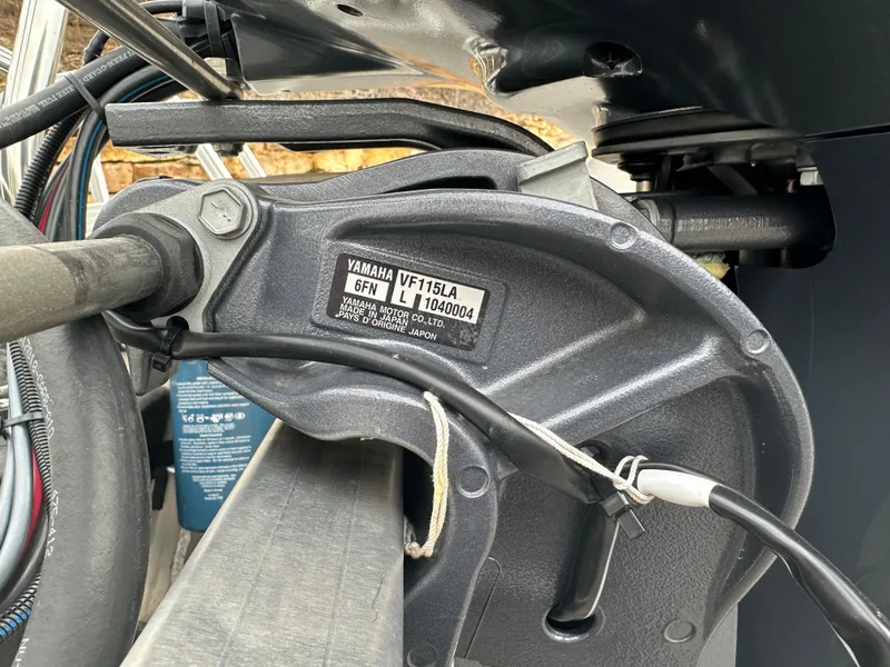 Slide: The Image of Close-up of Yamaha VF115LA engine part on 2024 Starcraft LX 22 F boat. - 7