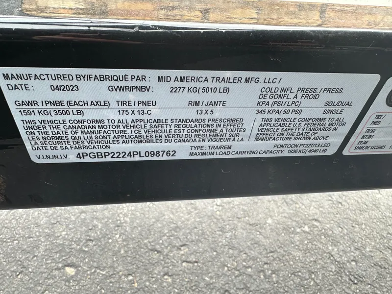 Slide: The Image of 2024 Starcraft LX 22 F trailer label, detailing specifications and manufacturing information. - 9