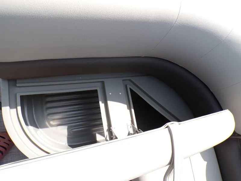Slide: The Image of 2024 Sun Tracker BASS BUGGY® 18 DLX interior seating and storage compartment detail. - 15