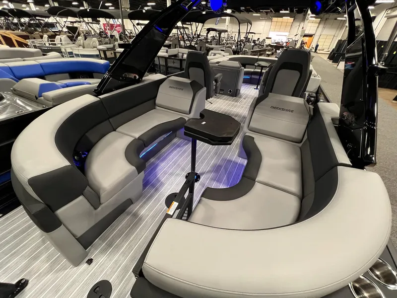Slide: The Image of 2025 Berkshire 25RFX Roswell Arch STS Tritoon interior with sleek seating and modern design. - 13