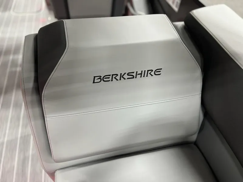 Slide: The Image of 2025 Berkshire 25RFX Roswell Arch STS Tritoon seat with logo, featuring sleek design. - 15