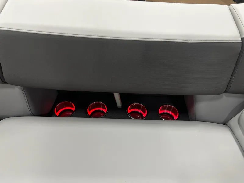 Slide: The Image of 2025 Berkshire 25RFX Roswell Arch STS Tritoon interior with illuminated cup holders. - 4