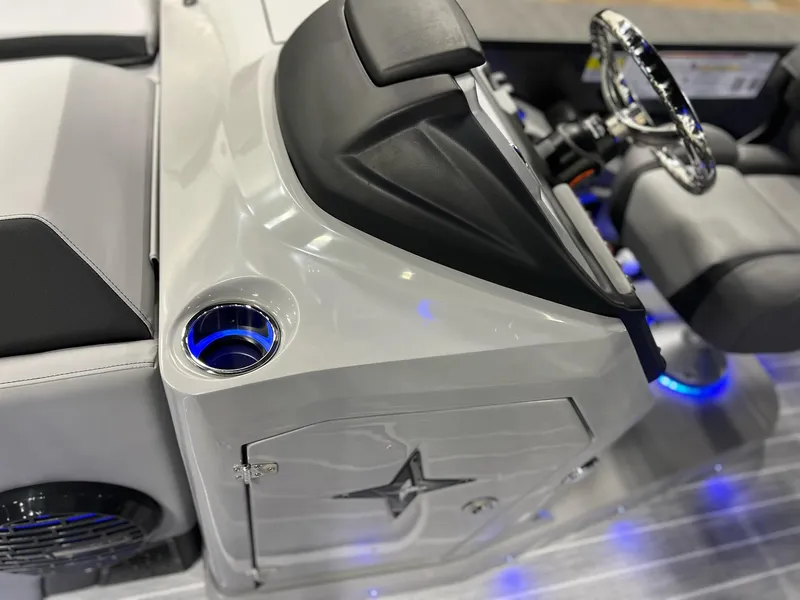 Slide: The Image of 2025 Berkshire 25RFX Roswell Arch STS Tritoon helm with illuminated cup holder and sleek design. - 41